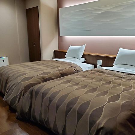 Ryotei Tanokura Hotel Jufu Kültér fotó