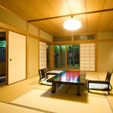 Ryotei Tanokura Hotel Jufu Kültér fotó