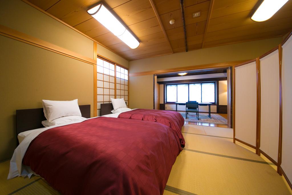 Ryotei Tanokura Hotel Jufu Kültér fotó