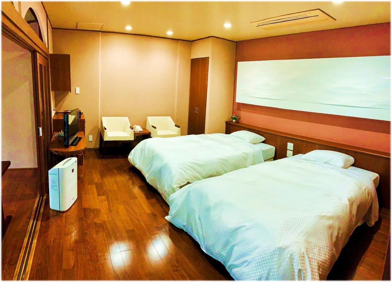 Ryotei Tanokura Hotel Jufu Kültér fotó